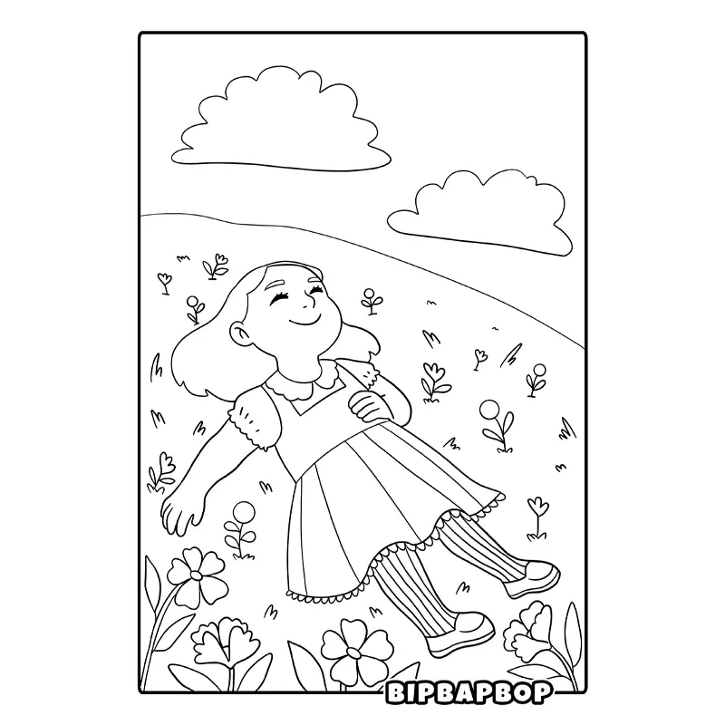 a girl lying in a field of flowers on a sunny spring day